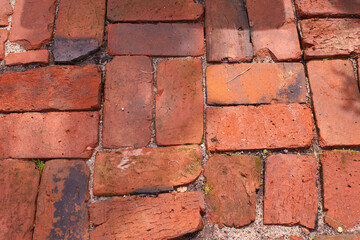playground is made of old red brick. recreation area.