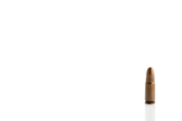 Military cartridge isolated on white background close-up. Full depth of field.