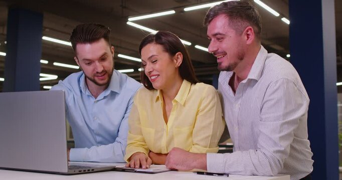 Managers at laptop online, happy helping client to choose, decide color of repairs work, future flat, interior designer talking to customer, finishing decorative materials for renovation, redecoration