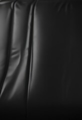 Fototapeta premium Luxurious black leather, reflecting light, smooth surface, graphic, elegant, macro photography