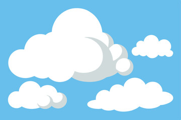 Fluffy white clouds float peacefully against the blue sky backdrop, creating a serene vista