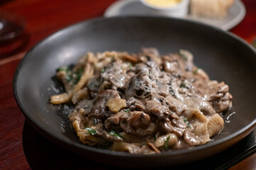 Campanella Pasta, mushroom and truffle cream sauce served on plate