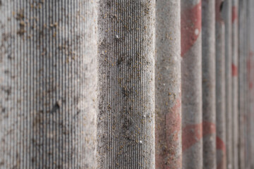Old and very dangerous asbestos roof. Asbestos dust in the environment. Asbestos removal
