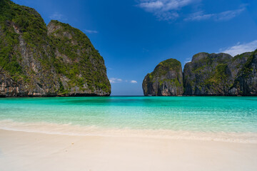 Fototapeta premium Beautiful tropical white sand beach and transparent sea at Maya bay in Krabi, Thailand After three and a half years of closure in order to restore the marine ecosystem