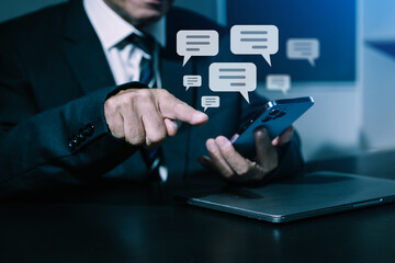 Man hands  User typing on smartphone and tablet chatting conversation in chat box icon pop up for social media marketing technology concept.