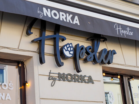 Blue Elegant Modern Storefront Sign of Hejduk by Norka Boutique in Urban Setting