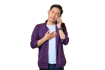 Pleased young Asian man in plaid shirt talking on mobile phone isolated on transparent background