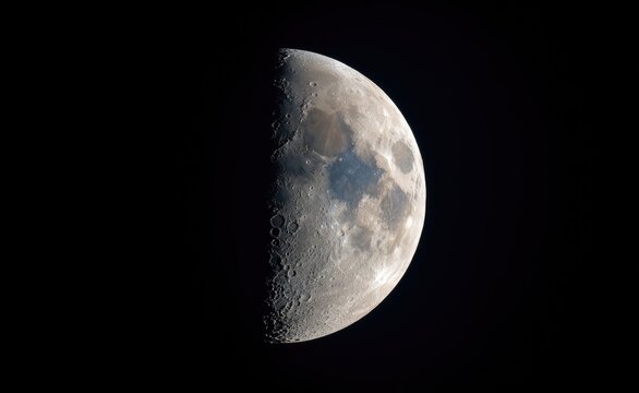 Close up picture of waxing crescent moon in blue sky - Powered by Adobe