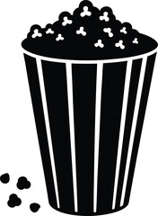 popcorn bucket with spilled popcorn on white 