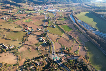 Aerial view of Segre river valley on sunny winter day. Oliana, Lleida, Spain.