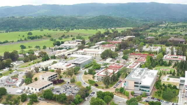 Aerial drone view of Menlo Park Palo Alto buildings offices green mountain hill