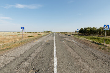 Asphalt road A 28 stretches through Akzhaik District in West Kazakhstan Region