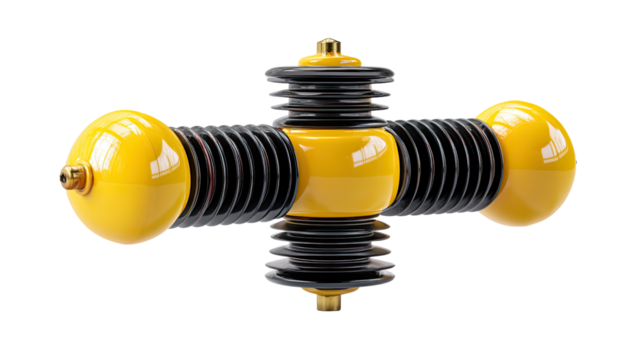 Yellow cross shaped device: A close-up studio shot presents an intriguing cross-shaped object with black ridged components and vibrant yellow orbs at its extremities.