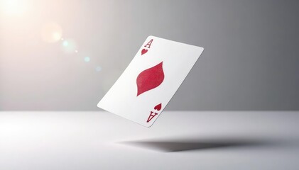 Obraz premium A single playing card flipping in the air, isolated on white , playing cards, paper