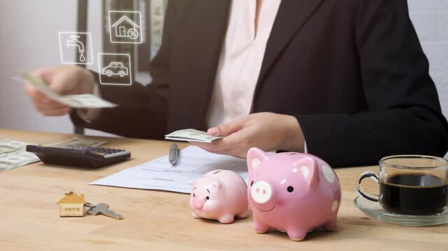 Allocate money for household expenses concept. people use calculator to calculate and divide money into bills for house utility payment. home budget investment strategy management.