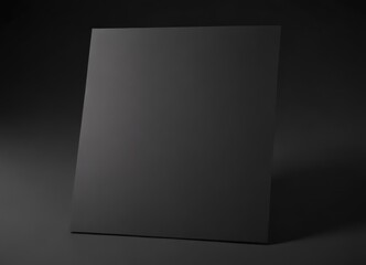 Sleek black paper sheet, subtly glossy finish  ,  sheet,  dark