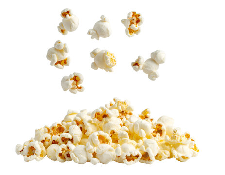 falling popcorn kernels in motion with a pile below, crispy white snack food isolated on background
