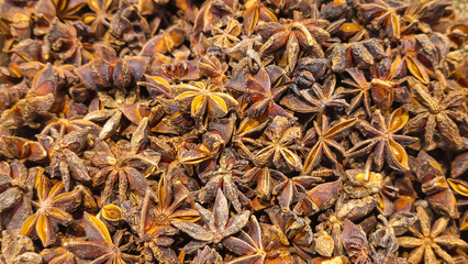 Anise or star anise are on the counter in the supermarket. Prepared for sale.