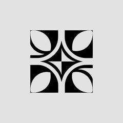 Abstract geometric design featuring four stylized petal shapes arranged in a symmetrical pattern.