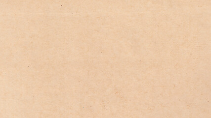 Fototapeta premium Closeup of a beige textured surface reminiscent of paper or sand 