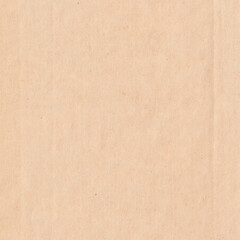 Closeup of a beige textured surface reminiscent of paper or sand