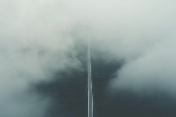 Fototapeta premium Foggy Road Through Clouds