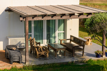 Obraz premium Wooden Furniture on Terrace Cyprus