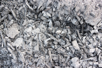 Gray ashes background texture. Grey ashes from the wood from the fireplace.