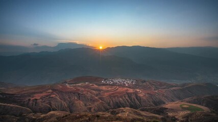 Timelapse captures stunning sunrise over red earth in Dongchuan Yunnan Province