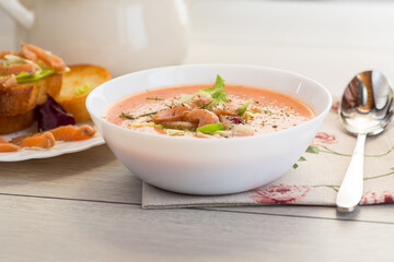 Cream soup of red fish with aromatic spices and herbs