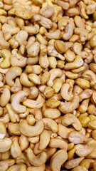Cashew nuts on the counter in the supermarket. Prepared for sale. Healthy eating