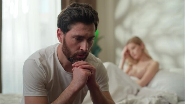 Sad Caucasian man suffering boyfriend girlfriend thinking conflict couple argument partners ignoring each other guy girl family divorce at home husband wife breakup frustrated woman problem headache