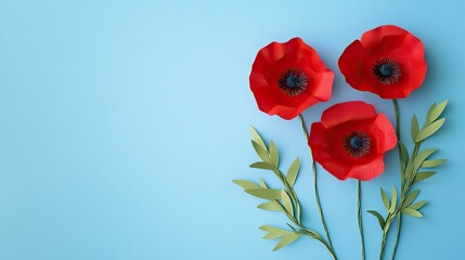 Obraz premium Red Paper Poppy Flowers on Light Blue Background