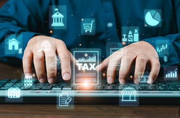A businessman calculates taxes using a calculator and a computer. Budgeting and tax calculation....