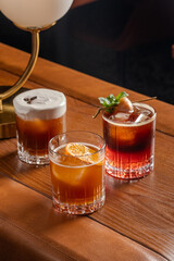 Three Exquisite Coffee Cocktails A Dark Dreamy Bar Scene