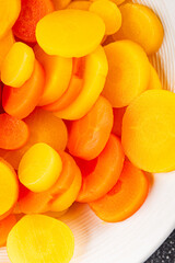 Carrot vegetable rings boiled vegetable dish fresh food background on the table rustic food top view copy space