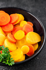 Carrot vegetable rings boiled vegetable dish fresh food background on the table rustic food top view copy space