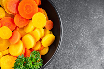 Carrot vegetable rings boiled vegetable dish fresh food background on the table rustic food top view copy space