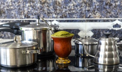 Traditional chimarrão served in a gourd and with araucaria pine nuts
