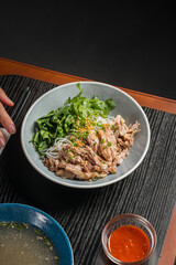 asian noodle with duck and vegetables