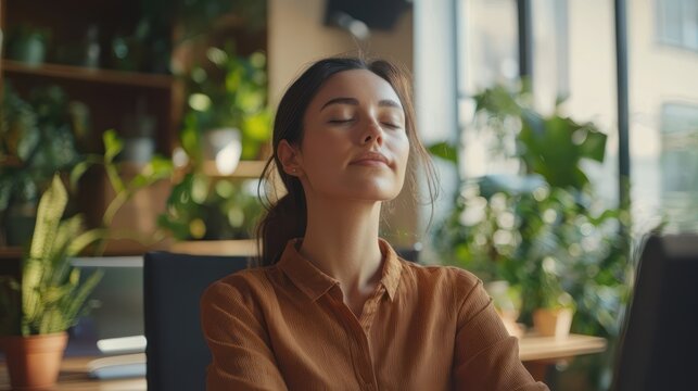 Calm breathing at workstation, mindful work environment