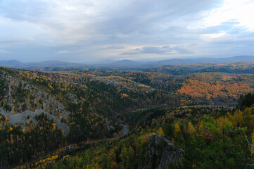 Hilly terrain in autumn. Mountain landscape.