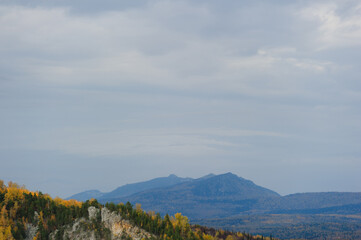 Hilly terrain in autumn. Mountain landscape.