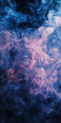 Obraz premium Colorful Smoke Swirling in Dark Background with Blue and Pink Hues