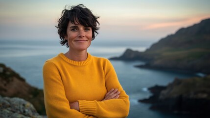 Fototapeta premium Woman smiling, coastal cliff, sunset, ocean view, travel blog