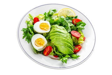 Avocado salad, boiled egg, tomato, green leaf lettuce, vegetable dish fresh delicious gourmet food background on the table rustic food top view copy space 