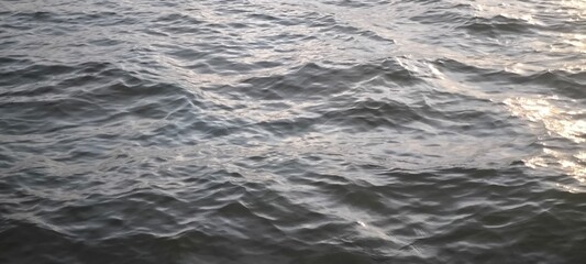 Water waves and evening light for background