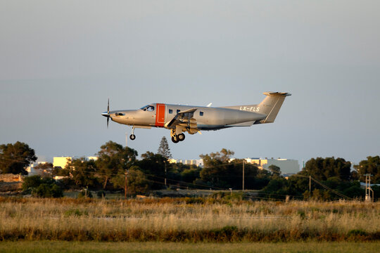 Luqa, Malta - April 30, 2025: Jetfly Aviation Pilatus PC-12-47E (PC-12 NGX) (Reg.: LX-FLS) on finals runway 31 in the fading sun.