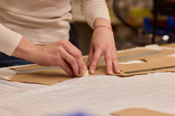 Tailoring Craftsmanship A Fashion Designer at Work Creating Beautiful Patterns with Precision