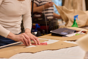Tailoring Craftsmanship A Fashion Designer at Work Creating Beautiful Patterns with Precision